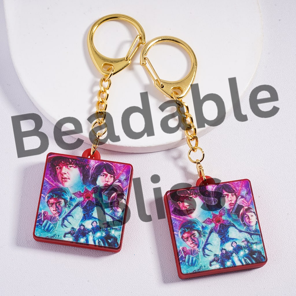 Keychains with colorful design on a white background