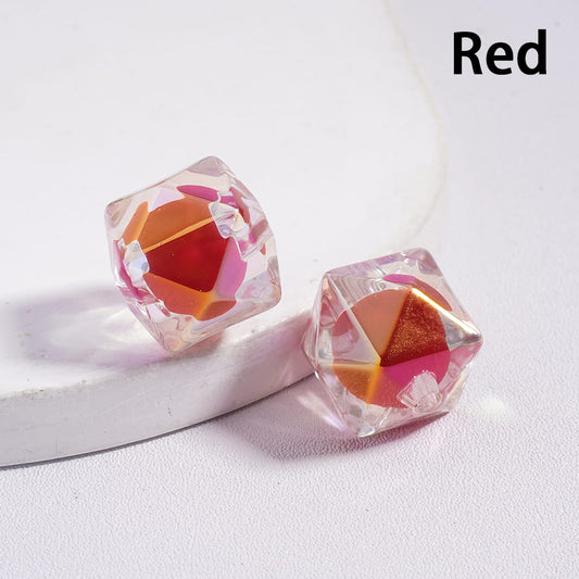 Crystal-like geometric earrings on a white background with 'Red' text.

