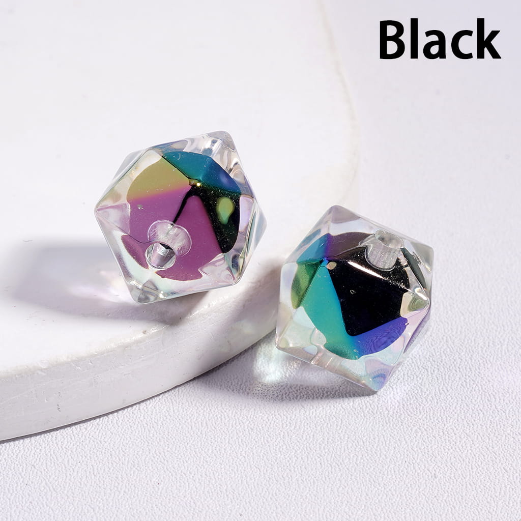 Multicolored geometric earrings on a white surface with 'Black' text above.

