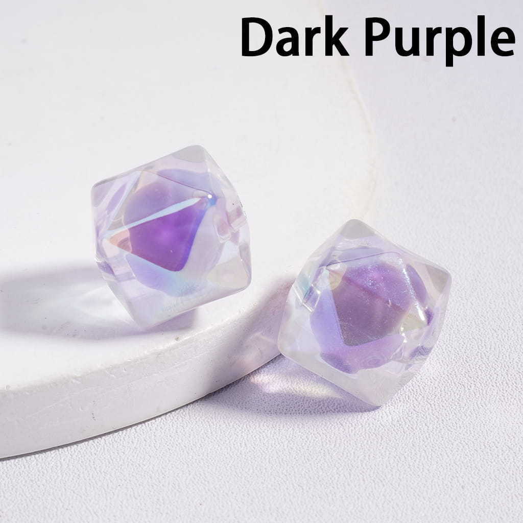 Dark purple geometric earrings on a white background


