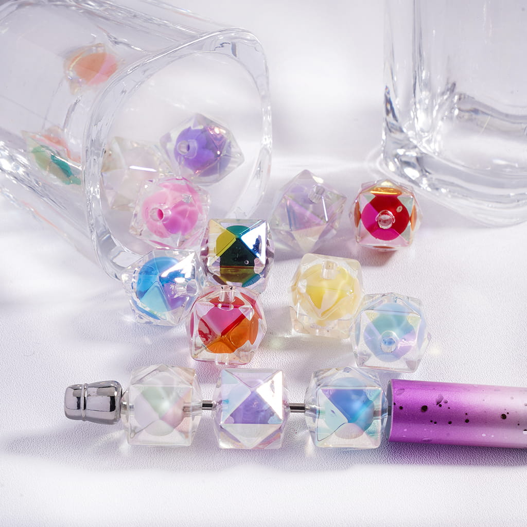 Colorful gemstone-shaped bottle stoppers on a white background

