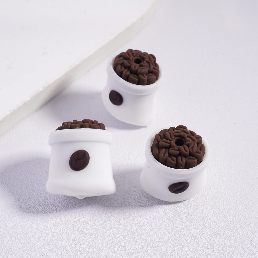 Three white containers with brown bean-like objects on a white background