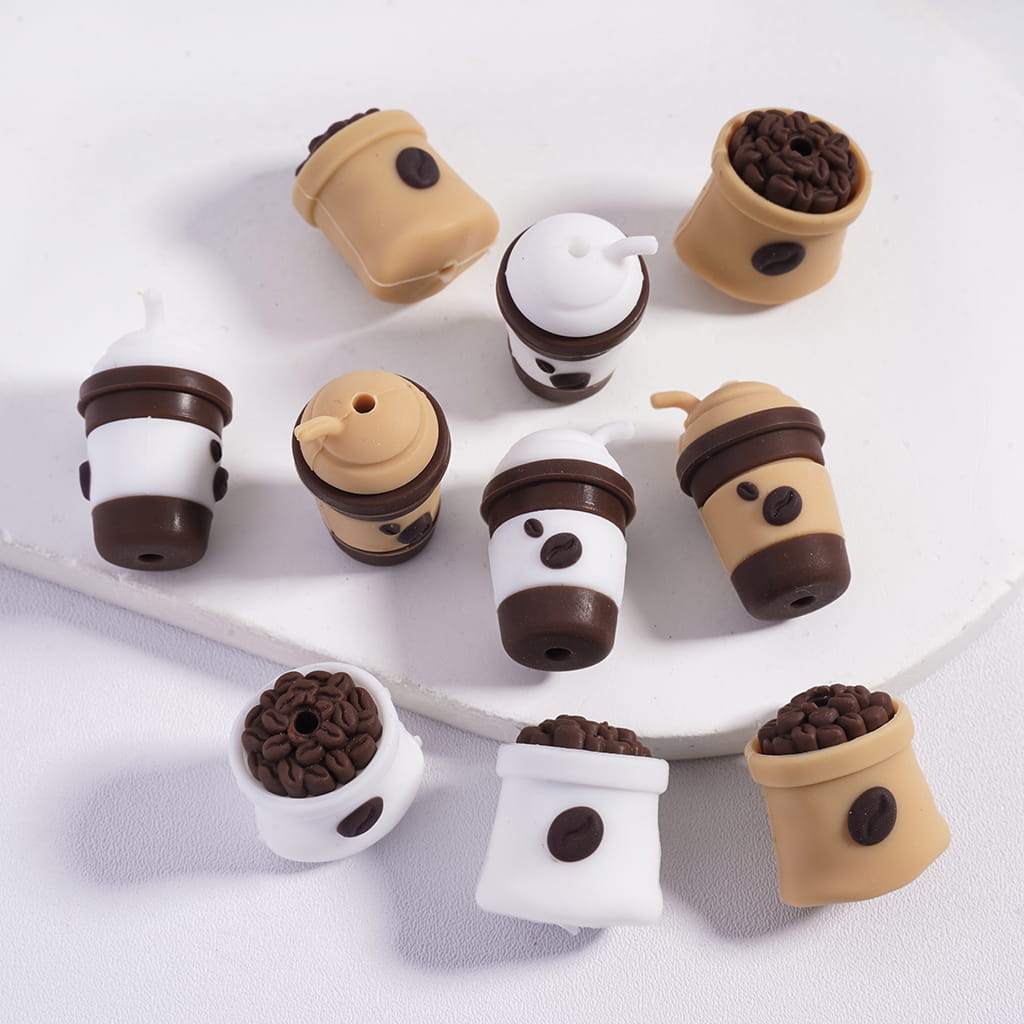 Coffee-themed USB drives arranged on a white surface