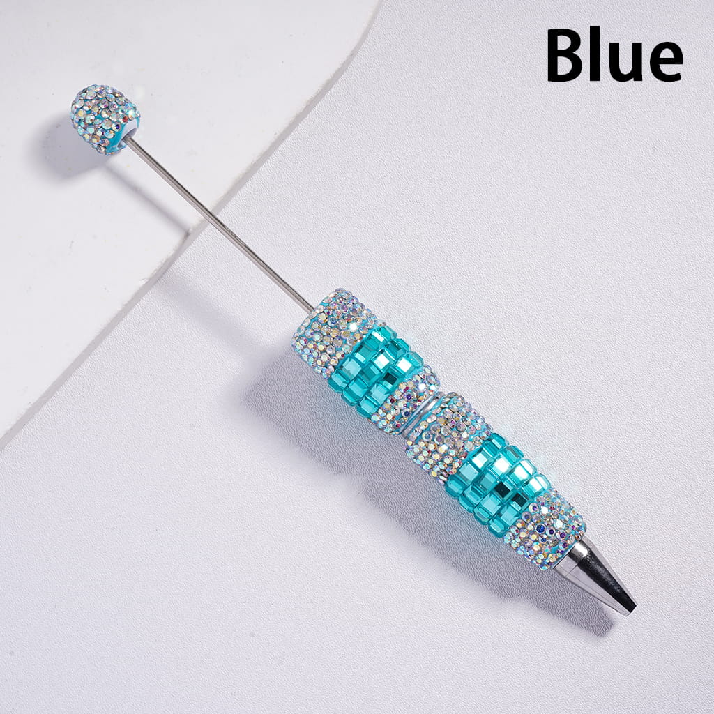 Blue beaded pen on a light gray background
