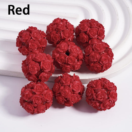 Red rose-shaped beads on a white background