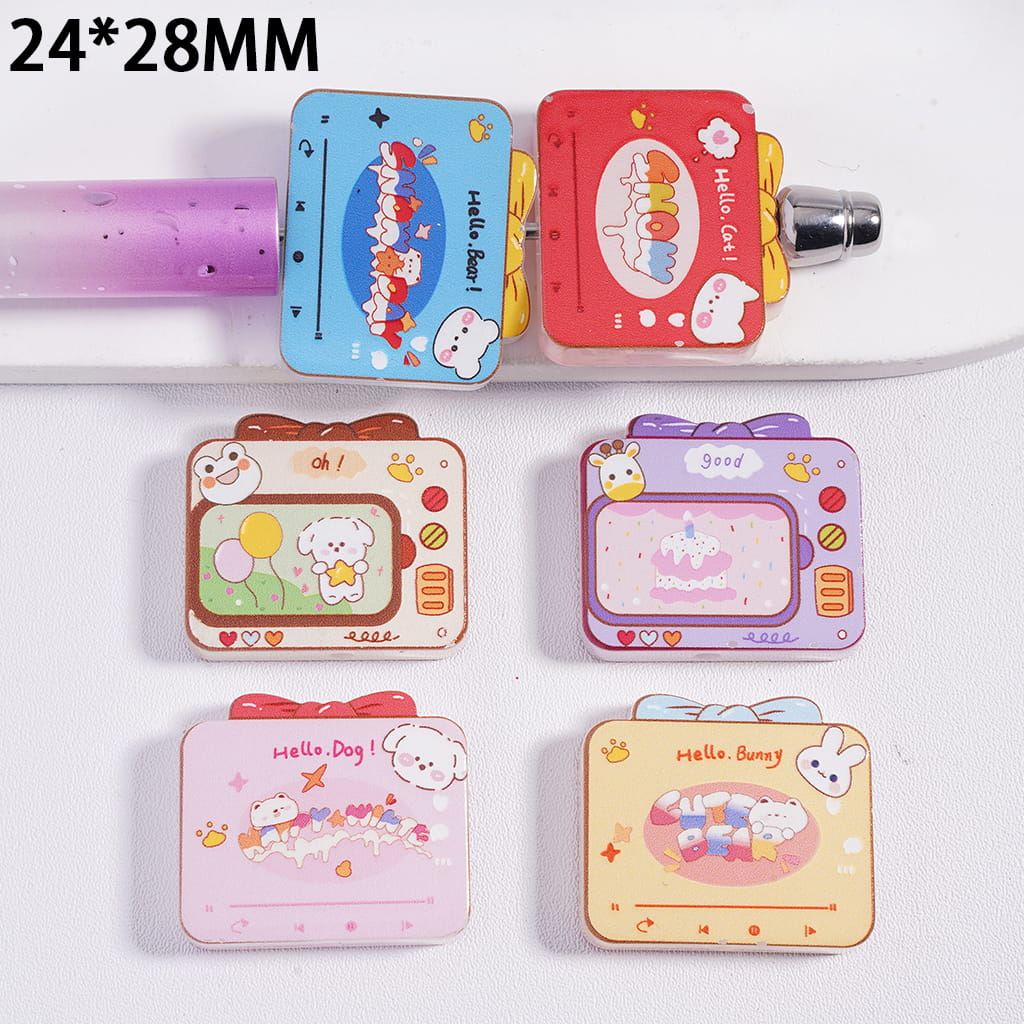Set of small, colorful card holders with cartoon designs on a white background.