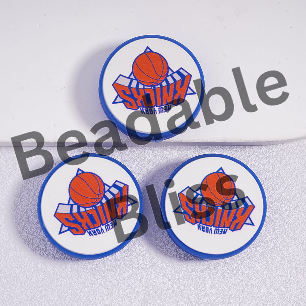 Three New York Knicks logo buttons on a white background with 'handsontosupply.com' text.