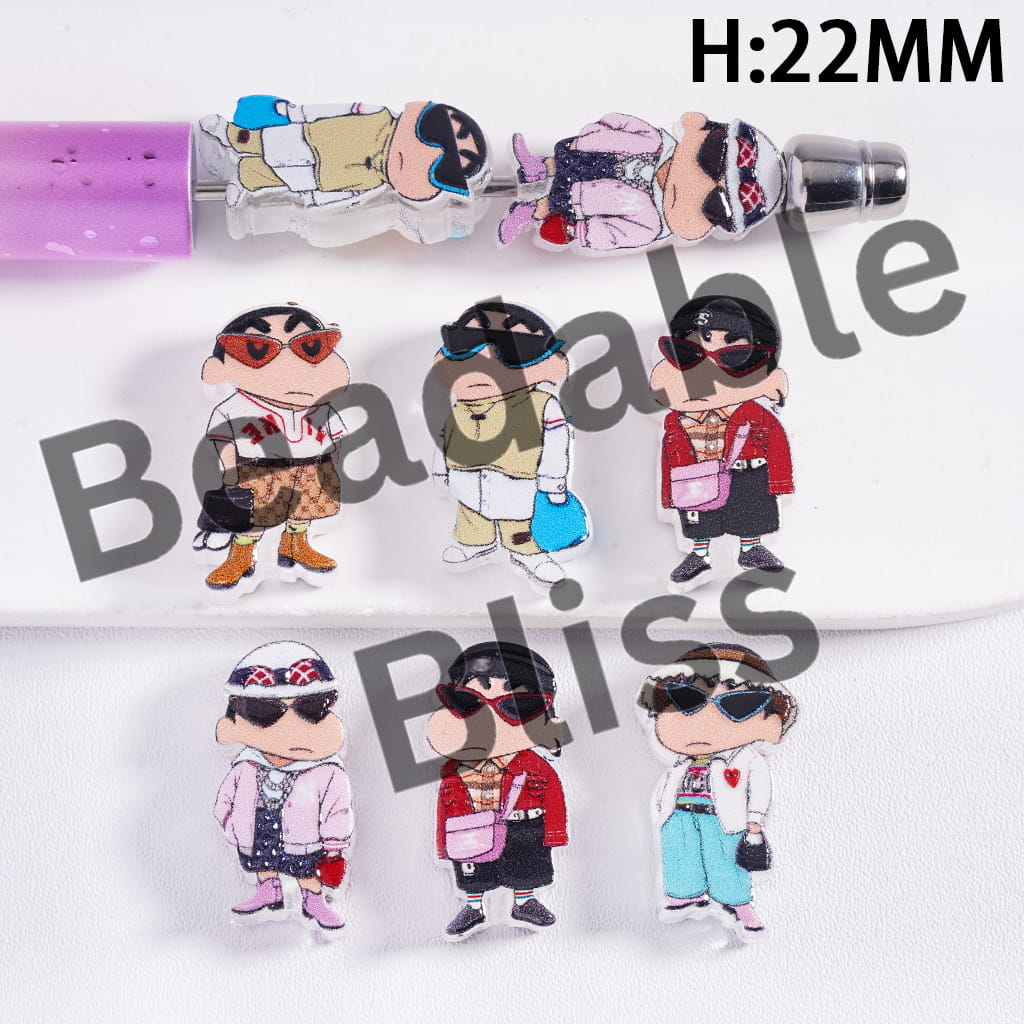 Cartoon character earrings with colorful outfits and accessories on a white background.