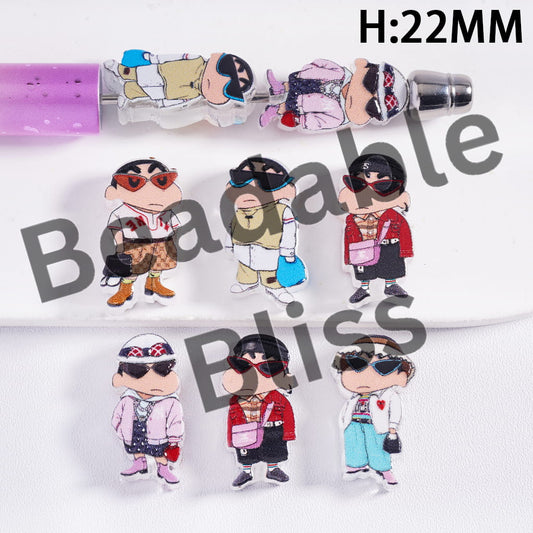 Cartoon character earrings with colorful outfits and accessories on a white background.