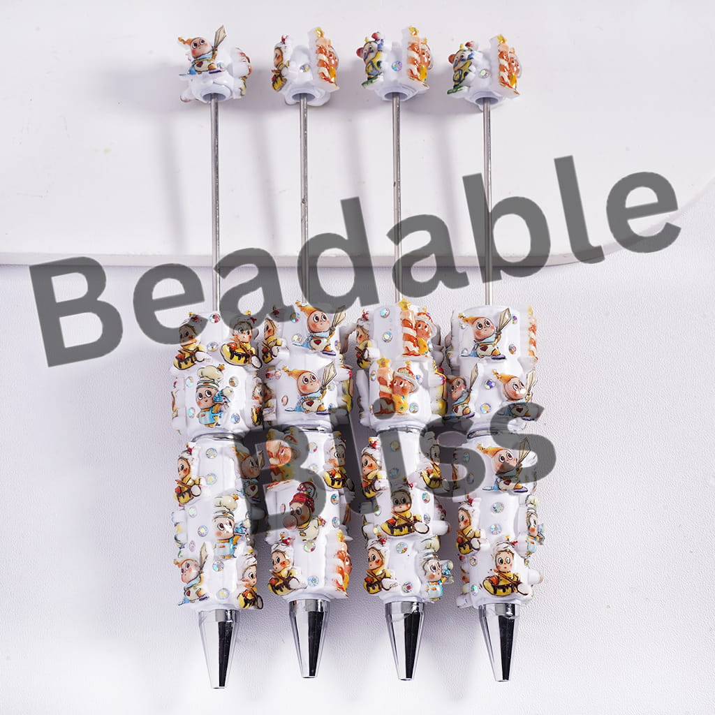 Set of pens with character designs on a white background, branded 'beadbalebliss'.