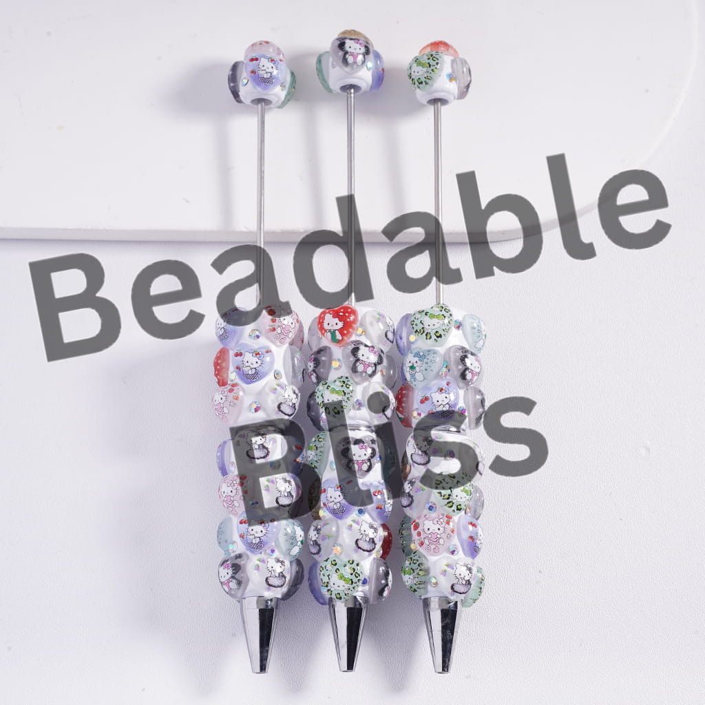Decorative sticks with colorful bead ends on a white background, branded 'beadablebliss'.