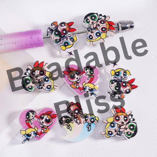 Cartoon character earrings on a white background with 'handsonty.com' branding.