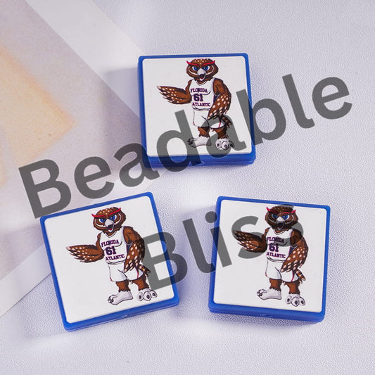 Three playing cards with a cartoon owl design on a white surface, branded 'handsontupply.com'.