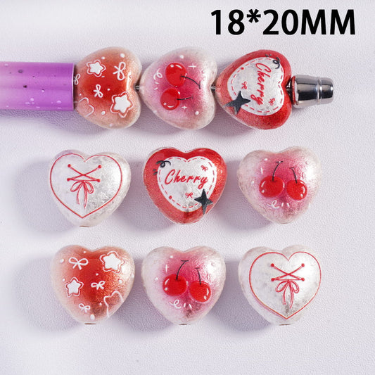 Heart-shaped beads with cherry designs on a white background, with measurement '18*20MM' displayed.