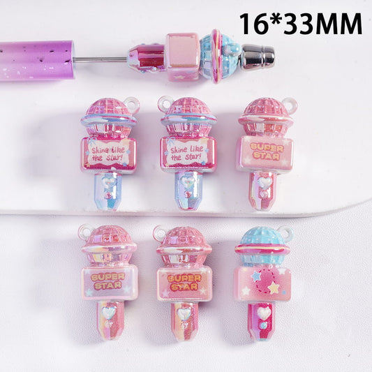 Decorative pink and purple hair clips with 'Super Star' text on a white background