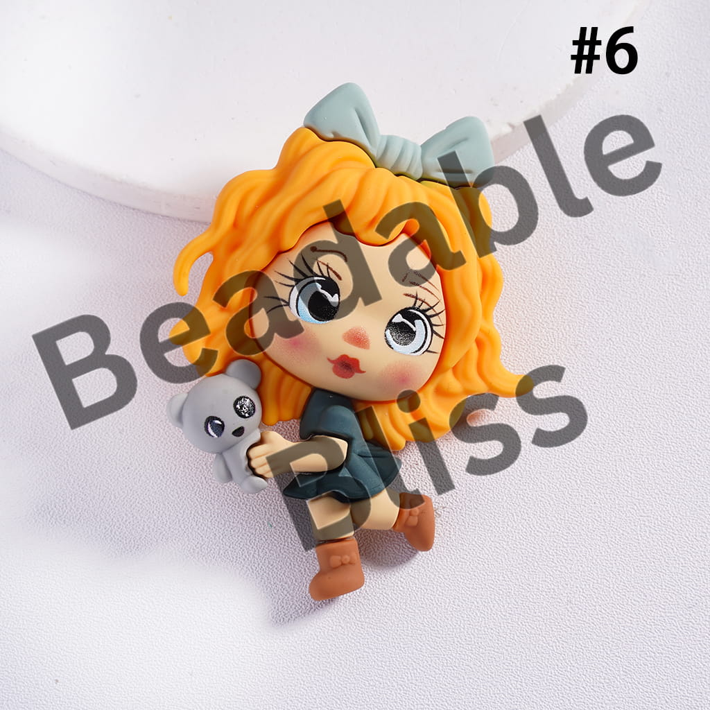 Fimo character with orange hair and a gray bow, holding a small gray creature, on a white background with 'handsonsupply.com' text.