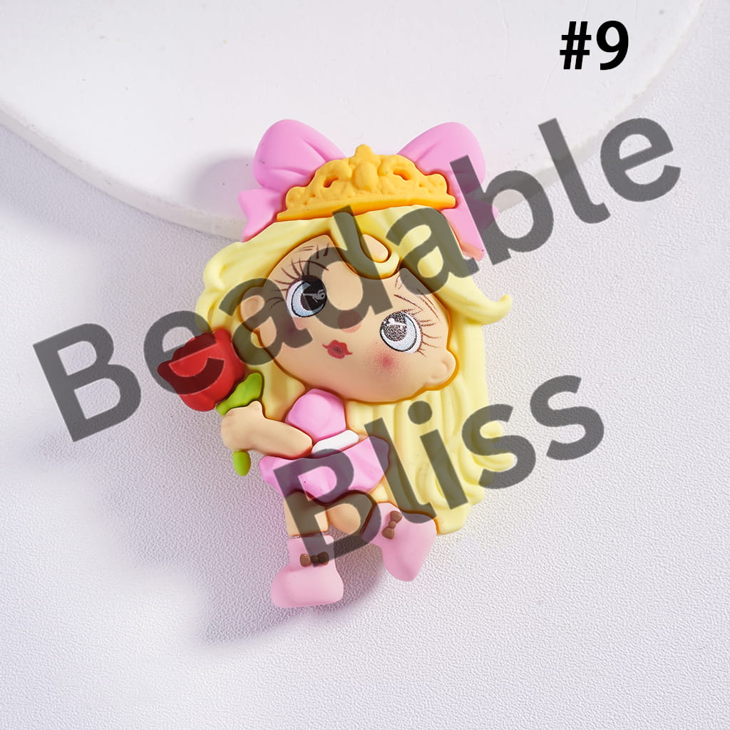 Colorful character pendant with a flower on a white background, branded 'handsontosupply.com'.