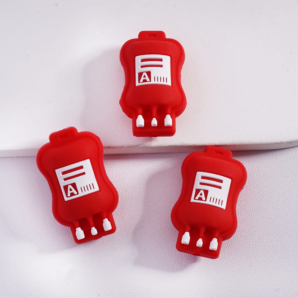 Three red cartoonish bottle-shaped objects with a white label on a light gray background