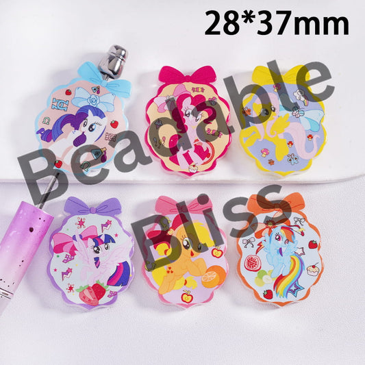 Set of colorful badge reels with cartoon designs on a white background.