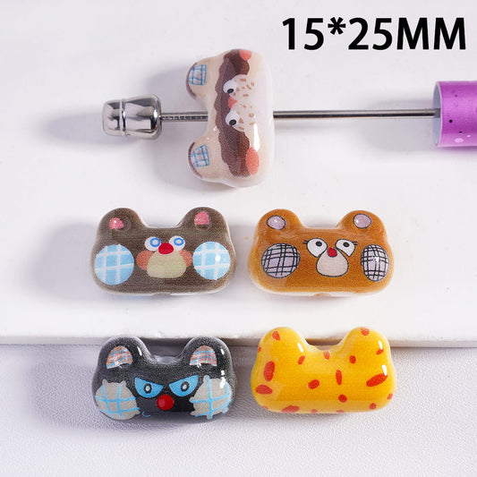 Set of colorful animal-shaped clips on a white background with measurement text.