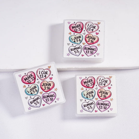 Three small boxes with heart-shaped designs and text on a white background