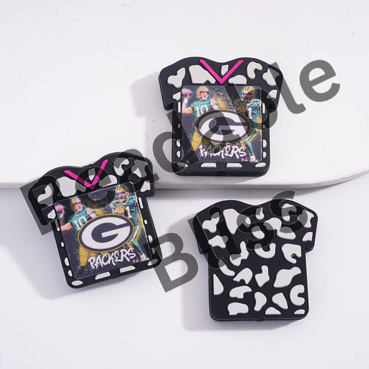 Three decorative items with a Packers logo on a white background