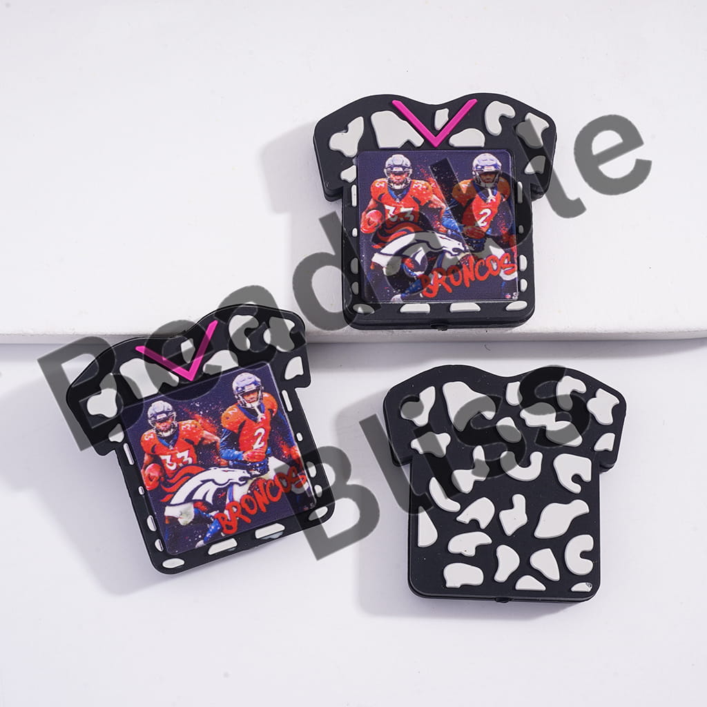 Two black and white patterned keychains with images of football players and 'Broncos' text on a white background.