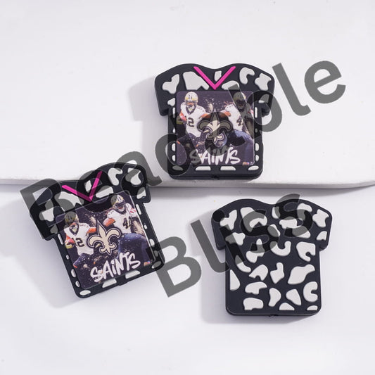 Three black and white patterned cases with New Orleans Saints branding on a white background.