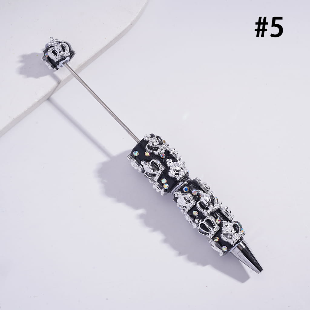 Decorative pen with intricate design on a light gray background