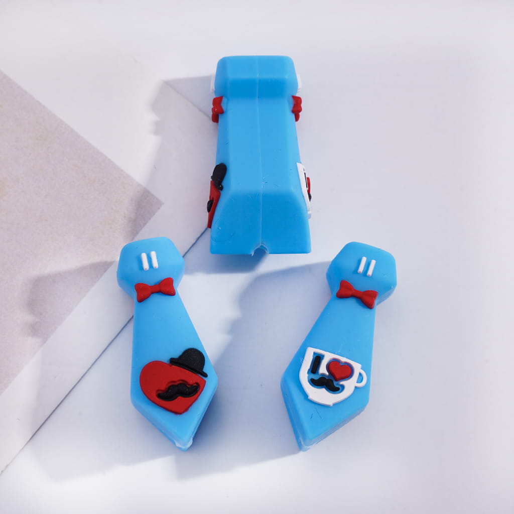 Blue novelty items with cartoon character designs on a light gray background