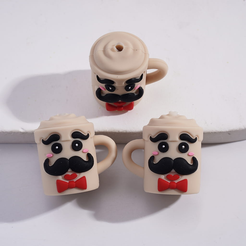 Three small ceramic mugs with mustache and bow tie designs on a white background
