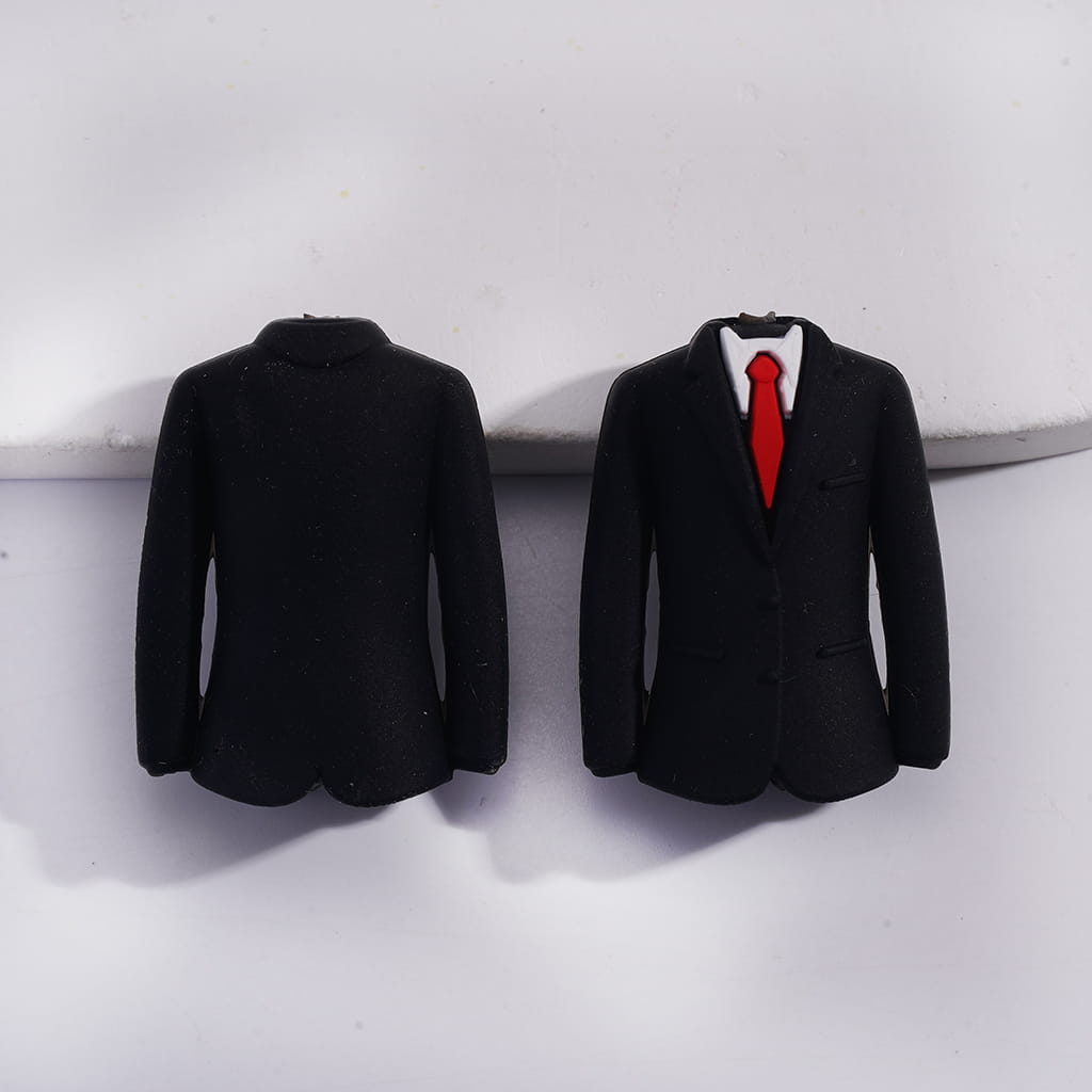 Black suit jacket with a red tie on a white background