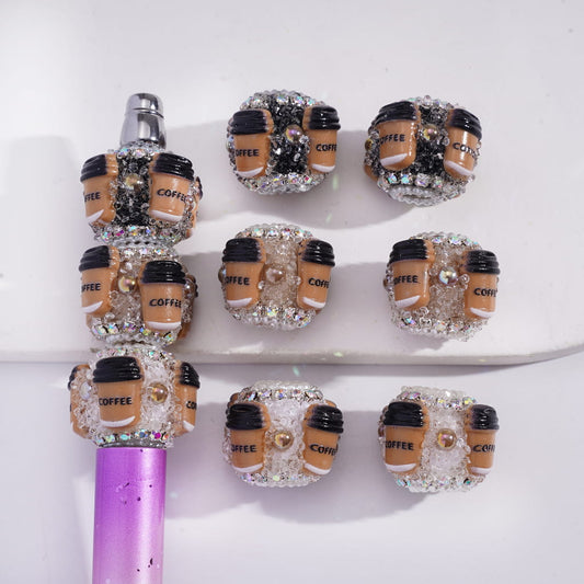 Decorative coffee-themed nail art designs on a white background 