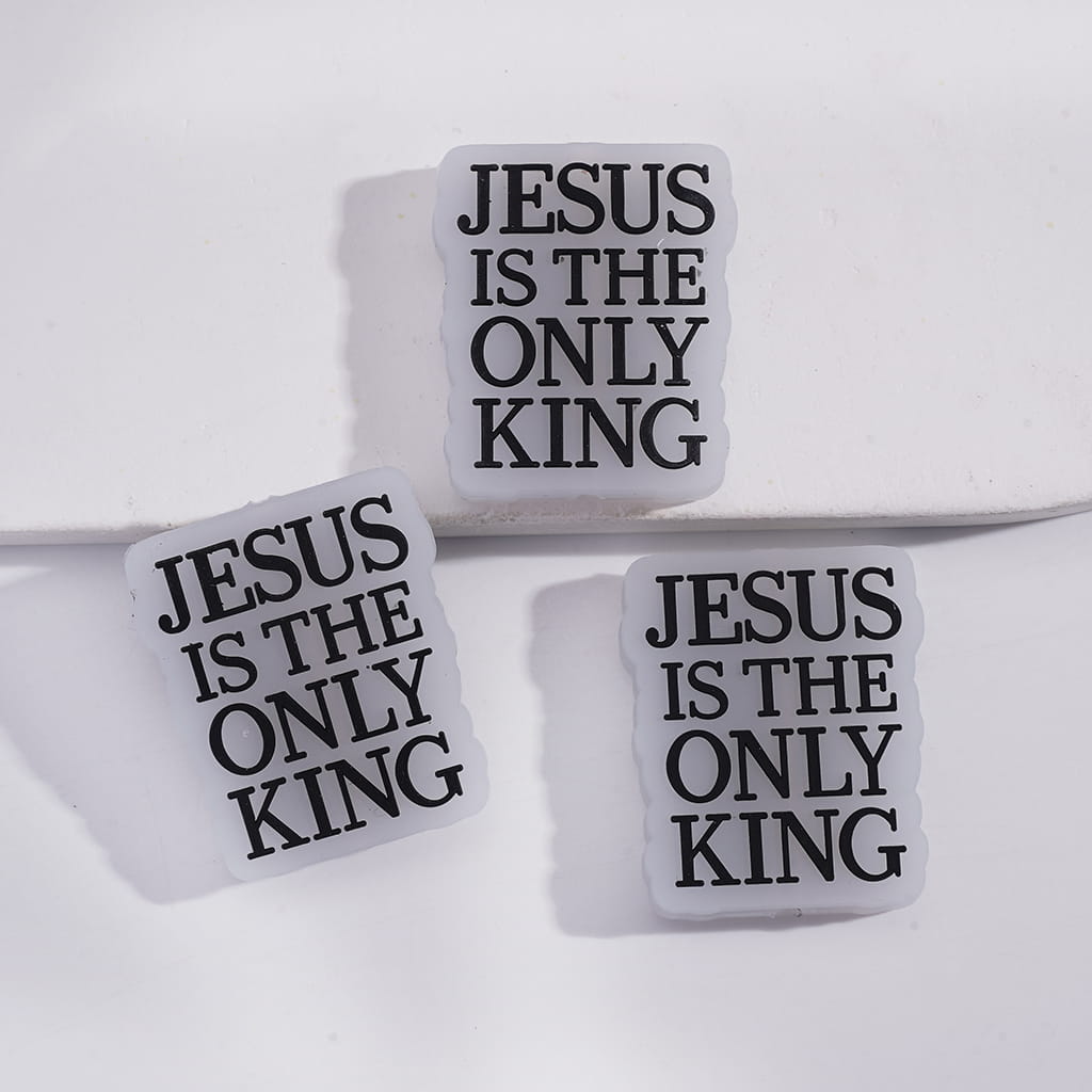 Three coasters with 'Jesus is the Only King' text on a white background
