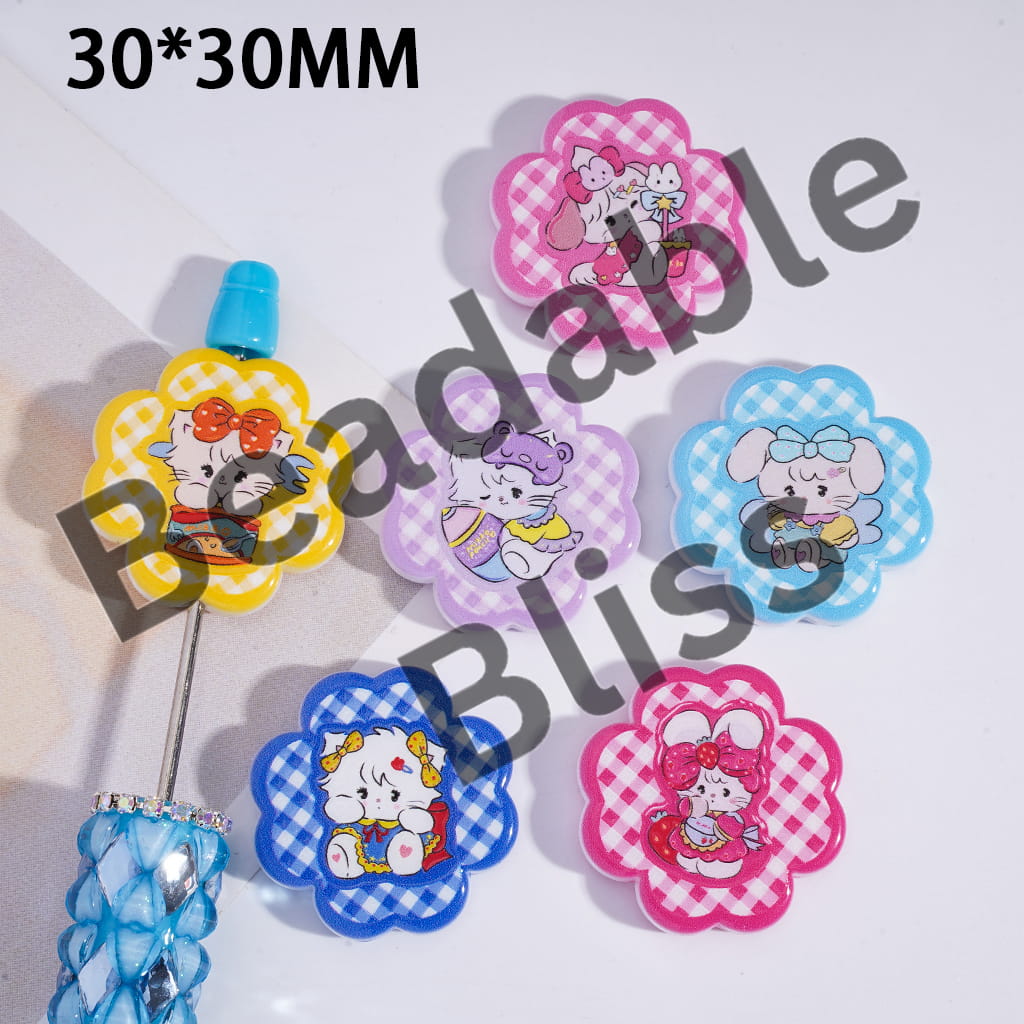 Colorful cartoon character beads with 'Beadable Bliss' branding on a white background.