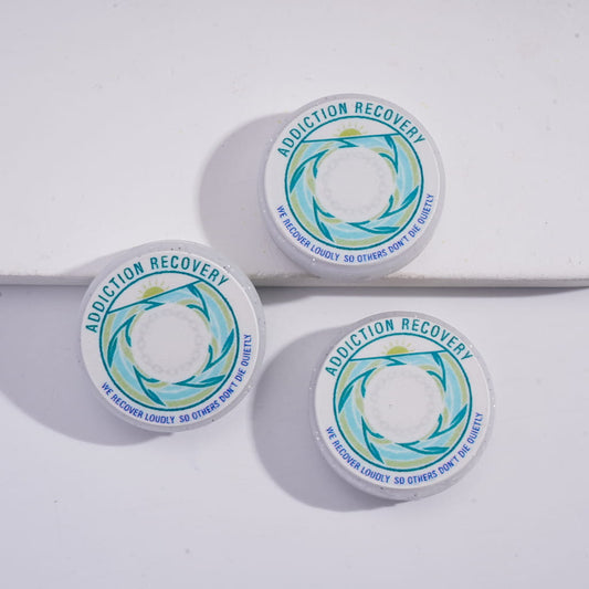 Three 'Addiction Recovery' containers with a white background