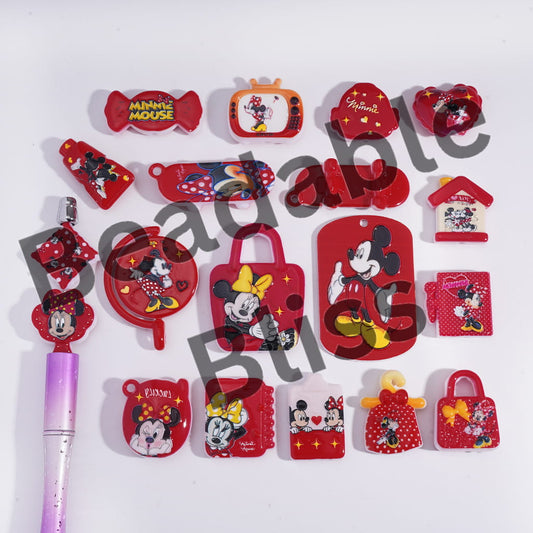 Collection of red and black Minnie Mouse-themed items on a white background.

