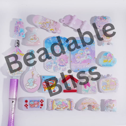 Collection of colorful stationery items with 'handsontupply' branding on a white background.