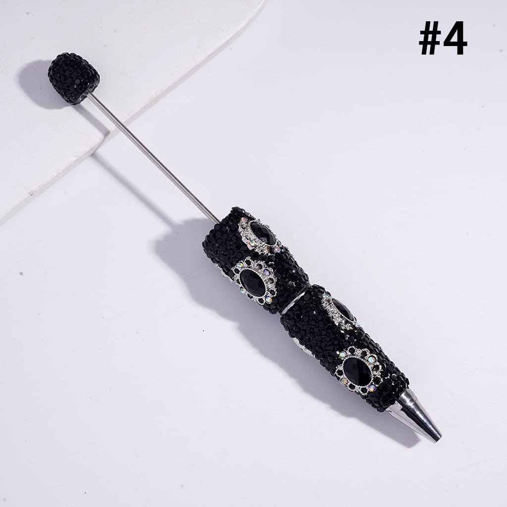 Black and silver decorative pen on a white background