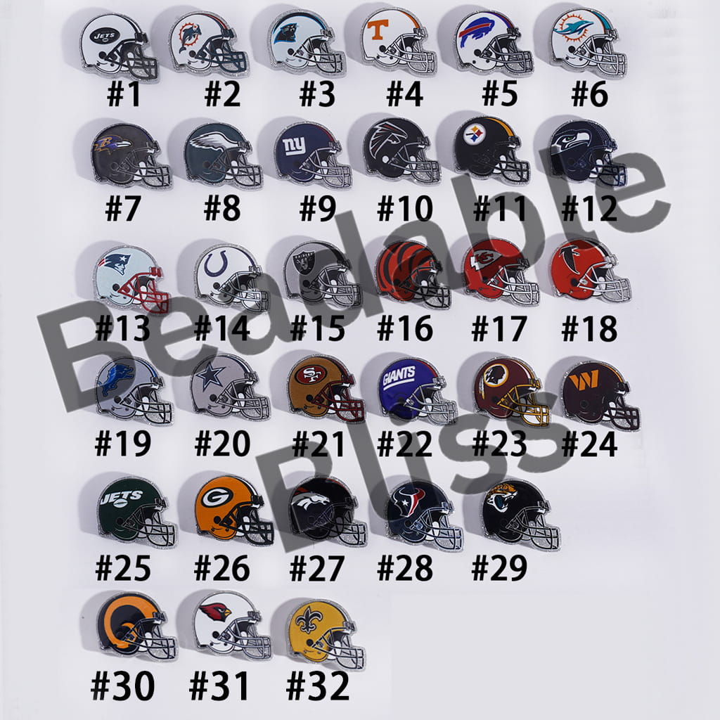Collection of 29 miniature football helmets with corresponding numbers on a white background.