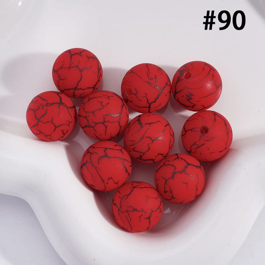 Red marbled beads on a white background with the number 90.