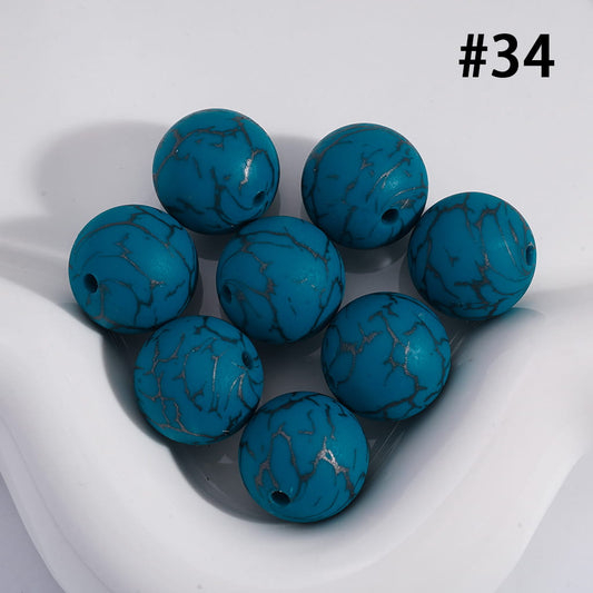 Blue marbled beads on a white background with the number #34.