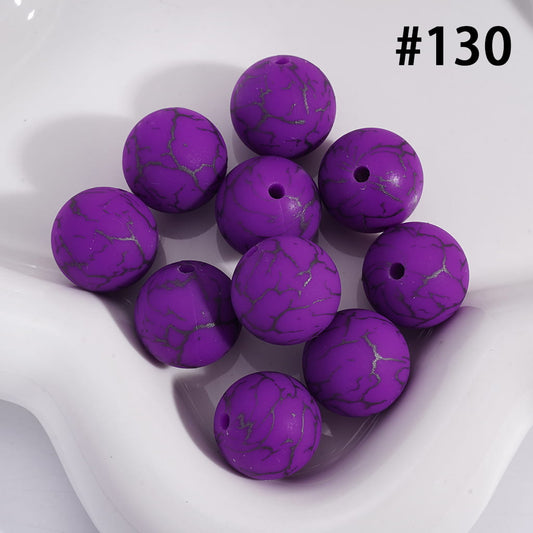Purple marbled beads on a white background with a visible brand number.