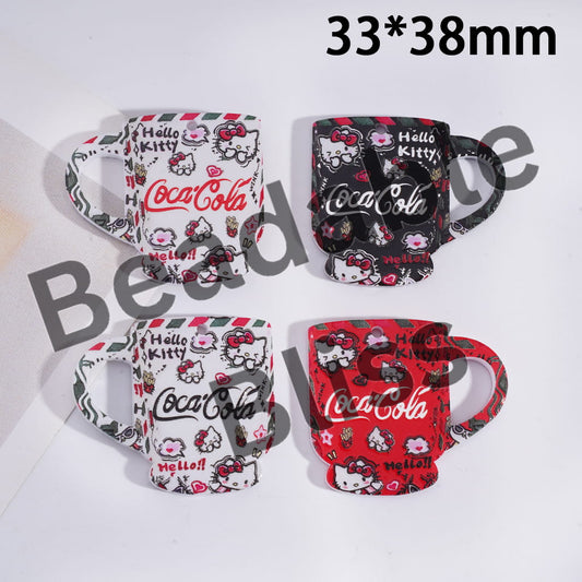 Four Coca-Cola Hello Kitty mugs on a white background