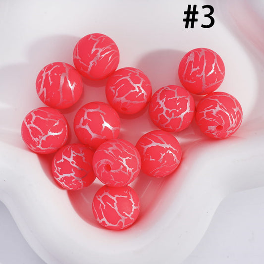 Red marbled beads on a white background with the number 3.