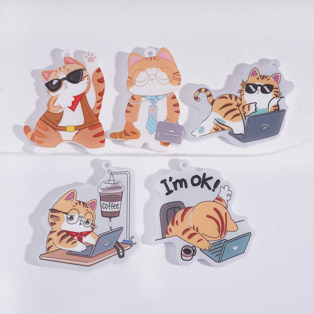Set of five cat-themed clear acrylic standees on a white background