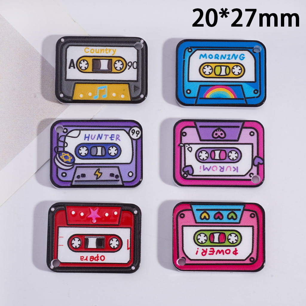 Six colorful cassette tape-shaped stickers with text on a white background