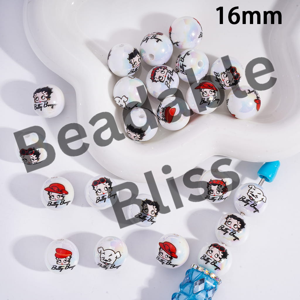 Collection of round buttons with cartoon character design on a white surface, with 'handsontosupply.com' branding.