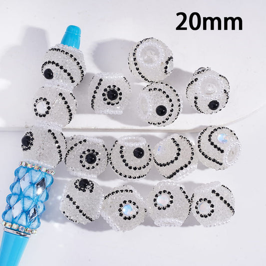 Decorative sticks with rhinestone designs on a white background, labeled '20mm'.