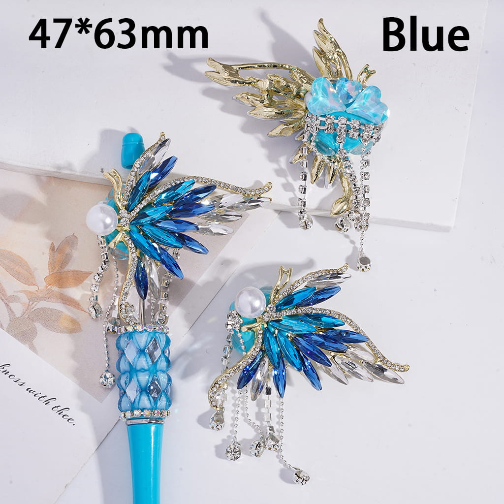 Decorative pen with blue and gold accents on a white background